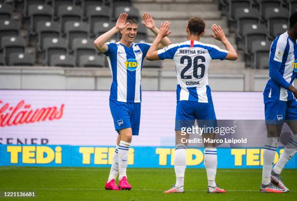 Krzysztof Piatek and Matheus Cunha of Hertha BSC celebrate after scoring the 2:0 during the Bundesliga match between Hertha BSC and Bayer 04...