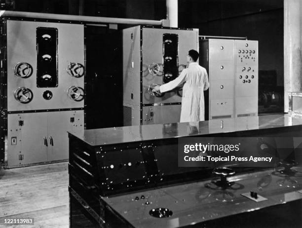 Technician at work at the Baird Television Radio transmitter at the BBC's first high definition television station at Alexandra Palace, London, 23rd...