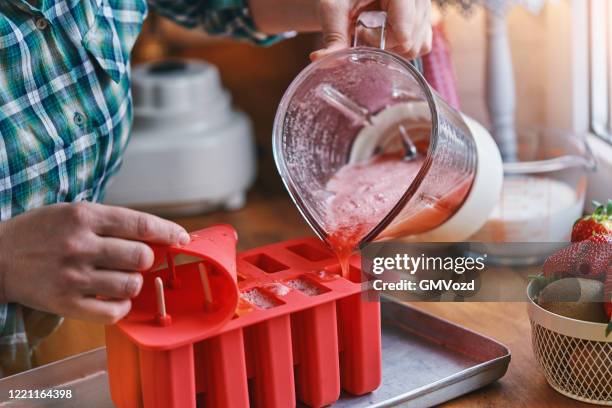 strawberry ice cream on stick - homemade icecream stock pictures, royalty-free photos & images