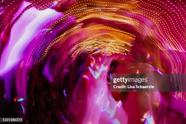abstract background - people dancing at a party - excess stock-fotos und bilder