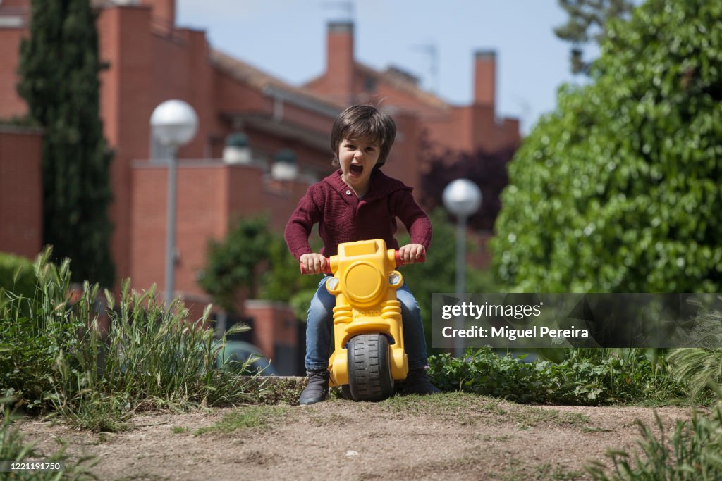 There-year-old boy rides his bike in Majadahonda