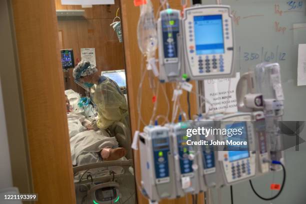Nurse tends to a COVID-19 patient in a Stamford Hospital Intensive Care Unit , on April 24, 2020 in Stamford, Connecticut. Stamford Hospital, like...