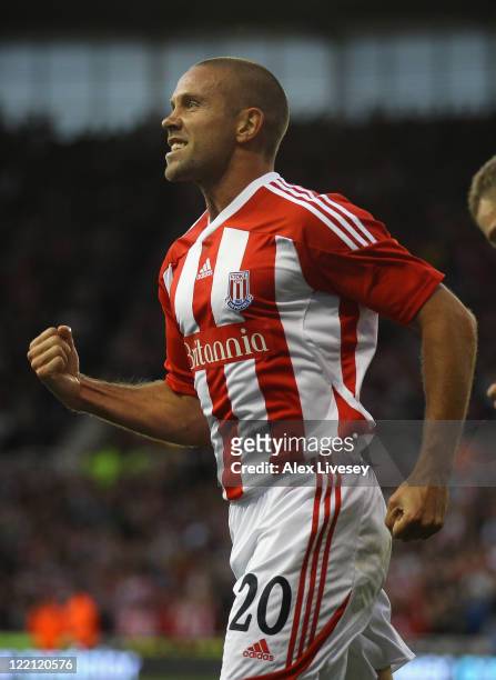 Matthew Upson of Stoke City celebrates after scoring the opening goal during the UEFA Europa League play-off second leg match between Stoke City and...