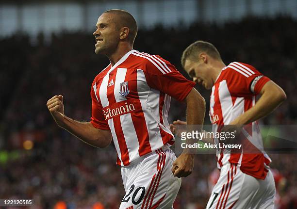 Matthew Upson of Stoke City celebrates after scoring the opening goal during the UEFA Europa League play-off second leg match between Stoke City and...