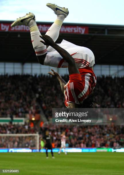Kenwyne Jones of Stoke City celebrates after scoring the second goal during the UEFA Europa League play-off second leg match between Stoke City and...
