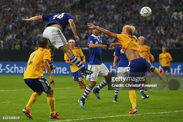 Kyriakos Papadopoulos of Schalke scores the forth goal during the UEFA Europa League play-off second leg match between FC Schalke and HJK Helsinki at...