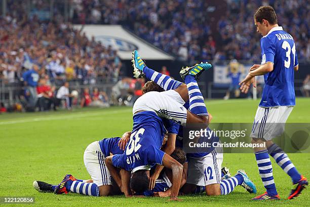 Schalke celewbrates the fifth goal during the UEFA Europa League play-off second leg match between FC Schalke and HJK Helsinki at Veltins Arena on...