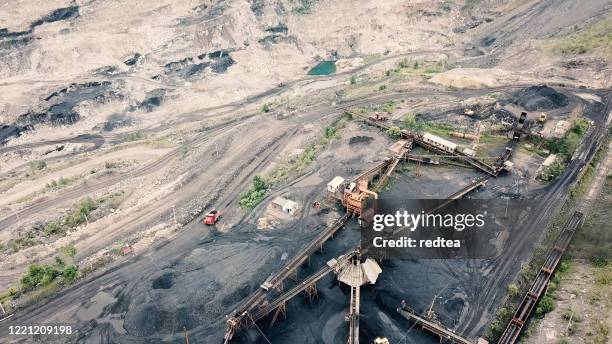 northeast china, a coal mine to be depleted.aerial view of opencast mining quarry - china environment mine imagens e fotografias de stock