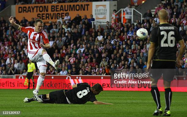 Glenn Whelan of Stoke City scores the third goal during the UEFA Europa League play-off second leg match between Stoke City and FC Thun at the...