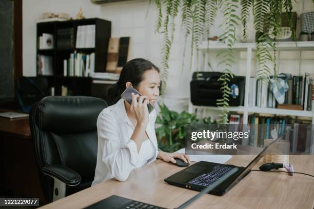 green office today :thai architect women working in her own greenery space - architect in landscape stock pictures, royalty-free photos & images