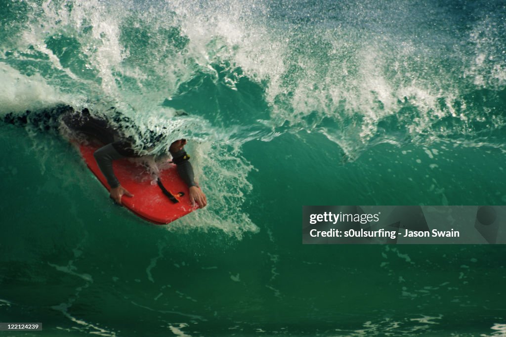 Bodyboard rider at Porthcurno