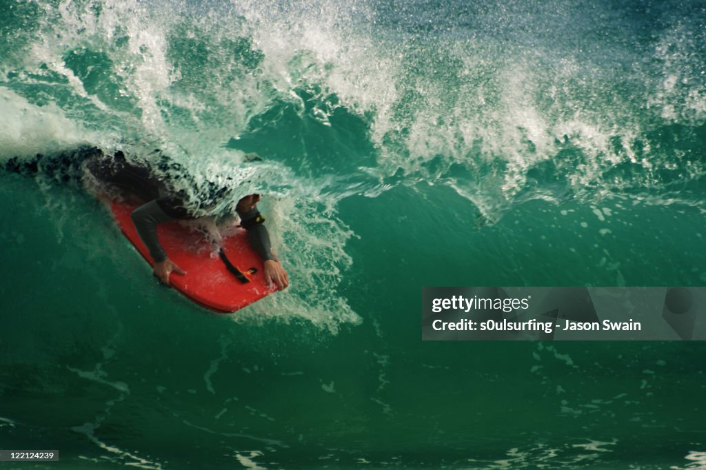 Bodyboard rider at  Porthcurno