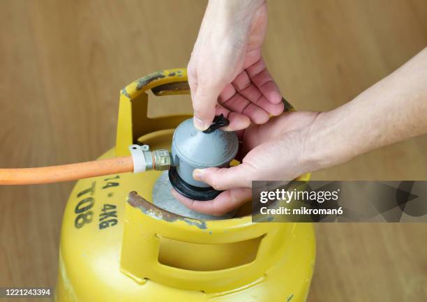 lpg gas bottle, butane gas cylinders - lpg-installation stock pictures, royalty-free photos & images