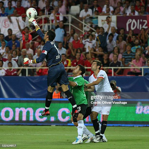 Keeper Andres Palop of the Sevilla saves the ball during the UEFA Europa League Play-Off second leg match between FC Sevilla and Hannover 96 at...