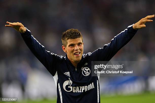 Klaas-Jan Huntelaar of Schalke celebrates after the UEFA Europa League play-off second leg match between FC Schalke and HJK Helsinki at Veltins Arena...