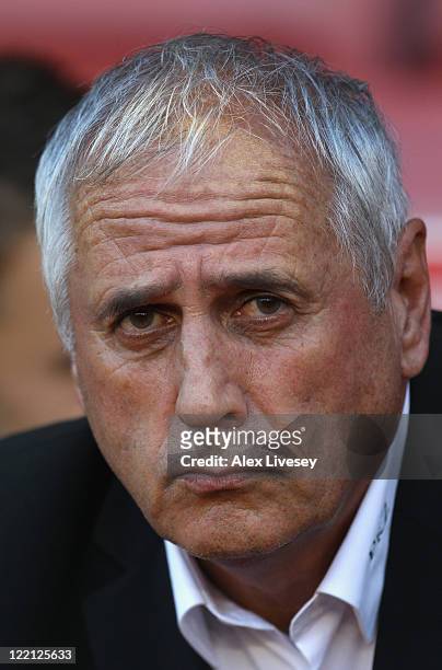 Bernard Challandes the coach of FC Thun looks on during the UEFA Europa League play-off second leg match between Stoke City and FC Thun at the...