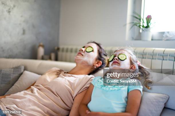 lazy spa day witm my mom - facial cleanse stock pictures, royalty-free photos & images