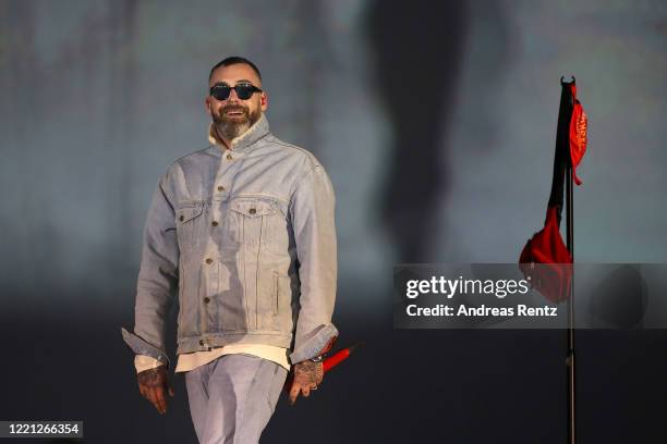 German Rapper Sido performs at the Georg Schutz drive-in cinema during the coronavirus crisis on April 26, 2020 in Dusseldorf, Germany. Drive-ins are...