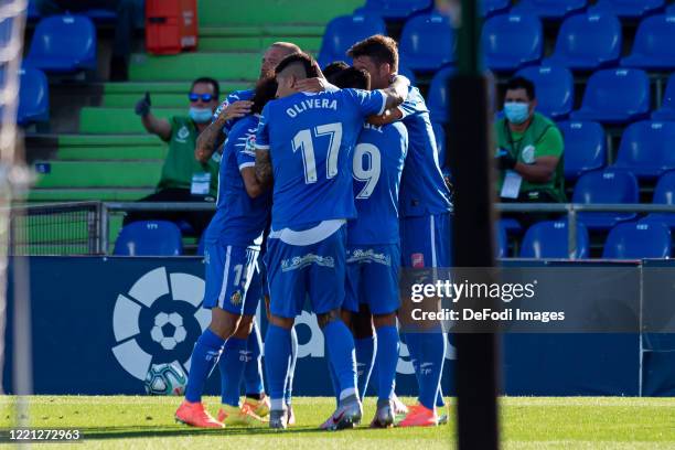 Oghenekaro Etebo of Getafe CF celebrates after scoring his team's first goal with teammates during the Liga match between Getafe CF and SD Eibar SAD...