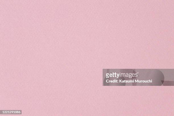 pink pastel paper texture background - pink colour stock-fotos und bilder