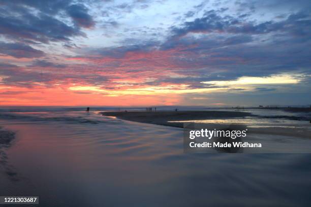 cloud sky and sunset at the beach - made widhana - fotografias e filmes do acervo