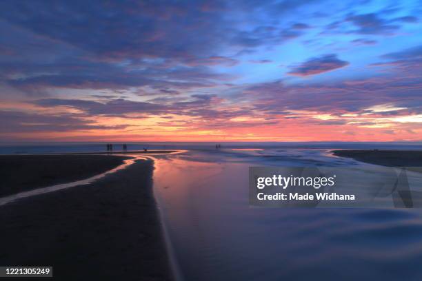 cloud sky and sunset at the beach - made widhana stock pictures, royalty-free photos & images