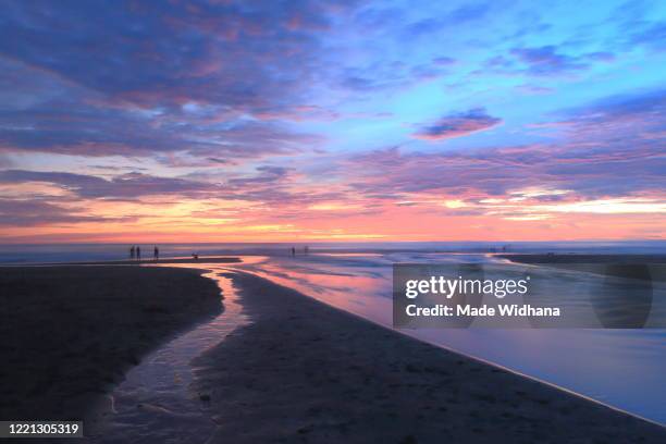 cloud sky and sunset at the beach - made widhana stock pictures, royalty-free photos & images