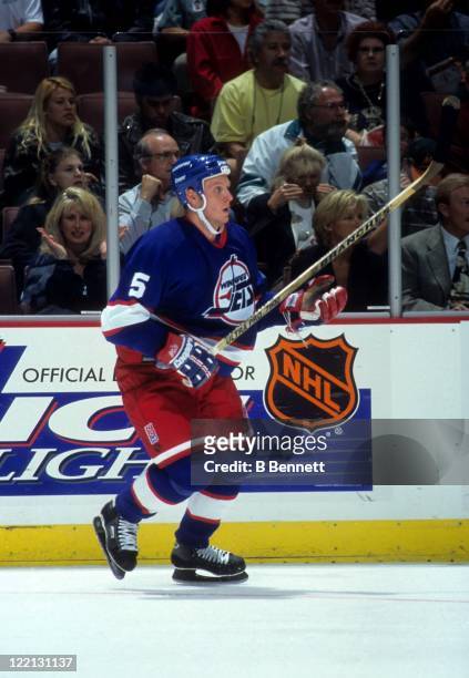 Deron Quint of the Winnipeg Jets skates on the ice during an NHL game against the Mighty Ducks of Anaheim on October 22, 1995 at the Arrowhead Pond...