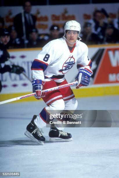 Teemu Selanne of the Winnipeg Jets skates on the ice during an NHL game against the Dallas Stars circa 1995 at the Winnipeg Arena in Winnipeg,...