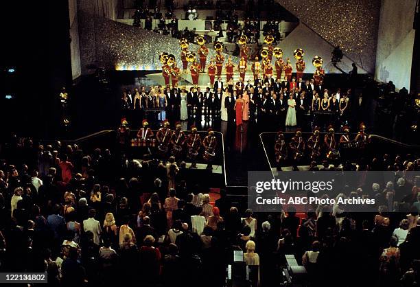 Airdate: March 29, 1976. ELIZABETH TAYLOR AND THE USC TROJAN MARCHING BAND WITH OSCAR WINNERS AND PRESENTERS