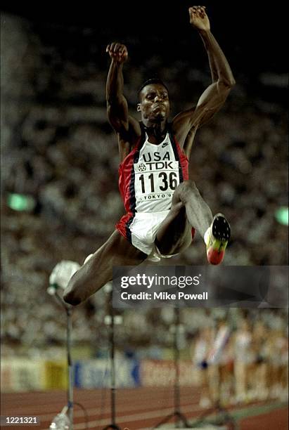 Carl Lewis of the USA in action during the Long Jump event of the World Championships at the Olympic Stadium in Tokyo. Lewis won the silver medal...