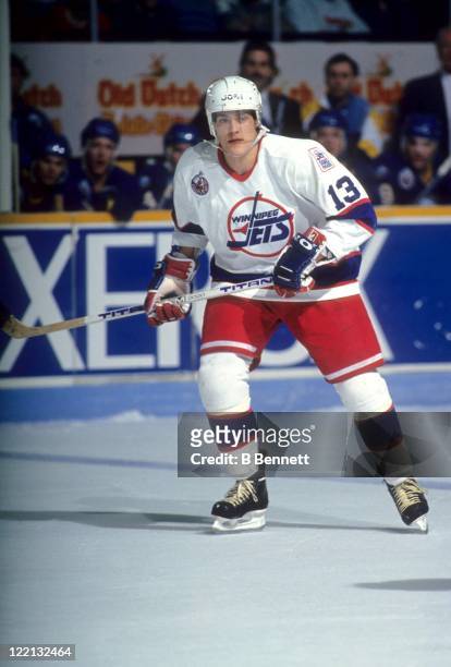 Teemu Selanne of the Winnipeg Jets skates on the ice during an NHL game against the Buffalo Sabres circa 1993 at the Winnipeg Arena in Winnipeg,...