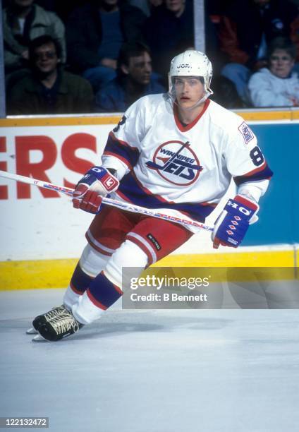 Teemu Selanne of the Winnipeg Jets skates on the ice during an NHL game circa 1995 at the Winnipeg Arena in Winnipeg, Manitoba, Canada.