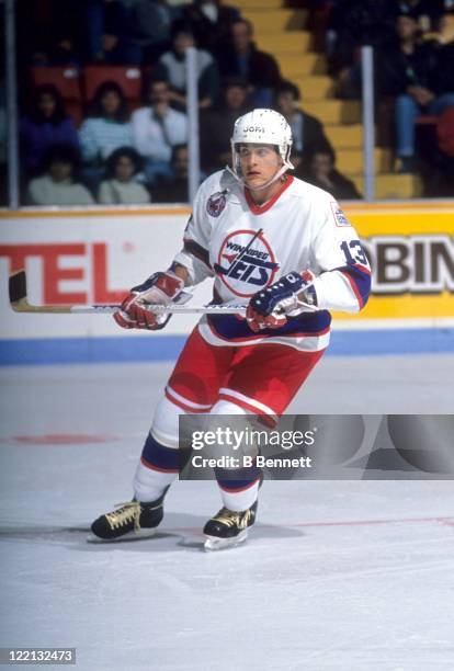 Teemu Selanne of the Winnipeg Jets skates on the ice during an NHL game circa 1992 at the Winnipeg Arena in Winnipeg, Manitoba, Canada.