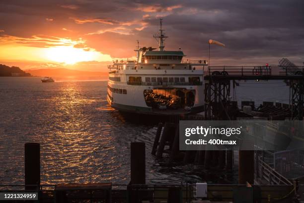 sunset - washington state ferry stock pictures, royalty-free photos & images