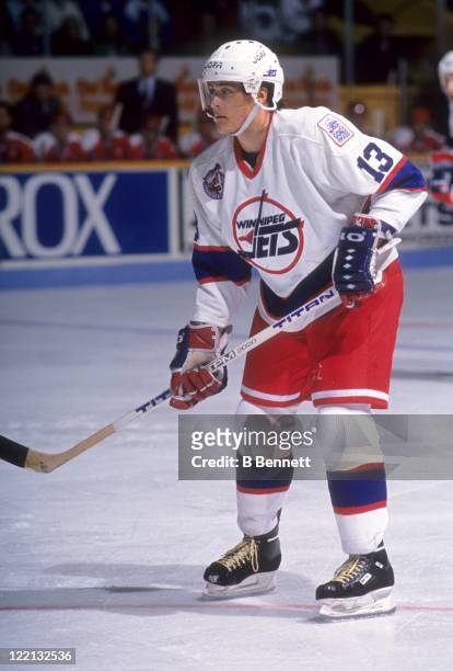 Teemu Selanne of the Winnipeg Jets skates on the ice during an NHL game against the Washington Capitals on October 26, 1992 at the Winnipeg Arena in...