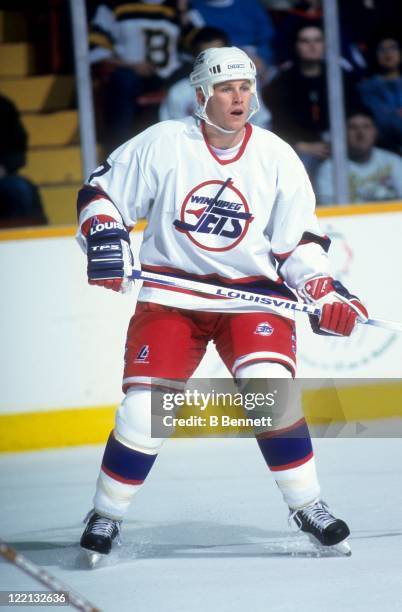 Keith Tkachuk of the Winnipeg Jets skates on the ice during an NHL game against the Boston Bruins on December 31, 1995 at the Winnipeg Arena in...