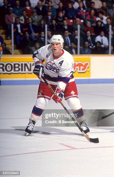 Keith Tkachuk of the Winnipeg Jets skates on the ice during an NHL game in March, 1993 at the Winnipeg Arena in Winnipeg, Manitoba, Canada.