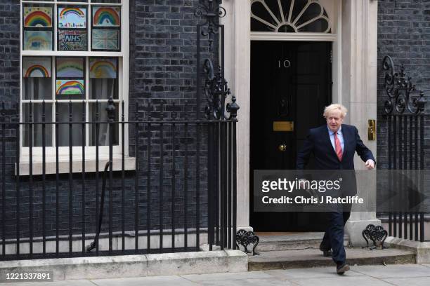 Prime Minister Boris Johnson leaves 10 Downing Street before making a speech as he returns to work following his recovery from Covid-19 on April 27,...