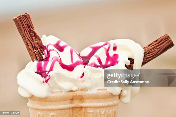 ice cream - raspberry coulis stock pictures, royalty-free photos & images