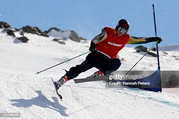 Scott Kneller of Australia competes in the Mens Ski Cross Quarter Final 1 during day 14 of the Winter Games NZ at Cardrona Alpine Resort on August...