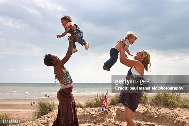 mums bonding with their sons - baby sussex stock pictures, royalty-free photos & images
