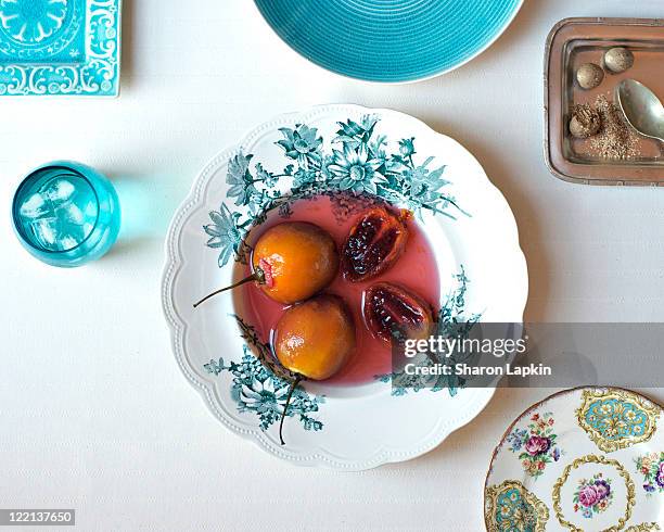 poached tamarillos - fine china stock pictures, royalty-free photos & images