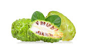 Noni with leaf on white background