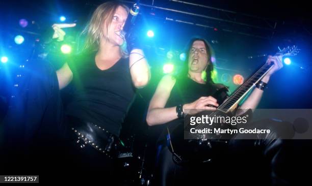 Vocalist Angela Gossow and guitarist Michael Amott of Swedish melodic death metal band Arch Enemy perform on stage in London, United Kingdom, 2001.