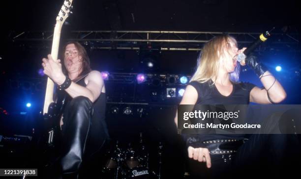 Vocalist Angela Gossow and guitarist Michael Amott of Swedish melodic death metal band Arch Enemy perform on stage in London, United Kingdom, 2001.