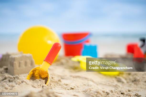 sand toy on the beach, summer and vacation concept. - digging beach photos et images de collection