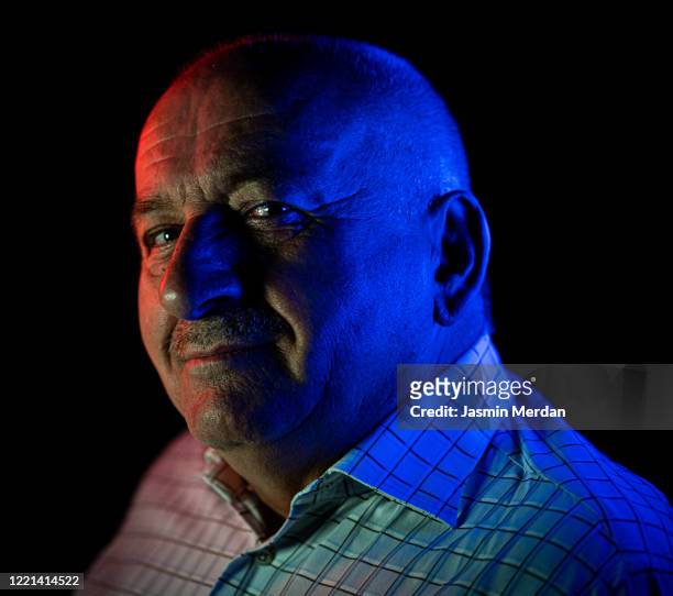 senior man with city lights in background - neon lighting smiling stock pictures, royalty-free photos & images