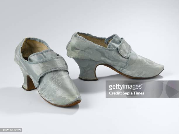 Women's shoe of light blue silk damask with two flaps over the instep, Women's shoe of light blue silk damask. Model: The head has a pointed nose,...