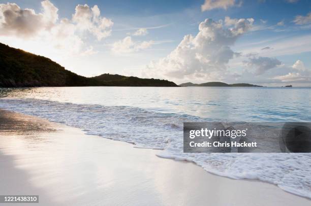 beach by mountain - trunk bay stock pictures, royalty-free photos & images